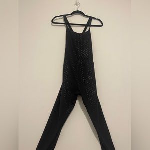 NEW WITH TAGS. Beyond Yoga Shiny Hearts Jumpsuit in Black Sz L